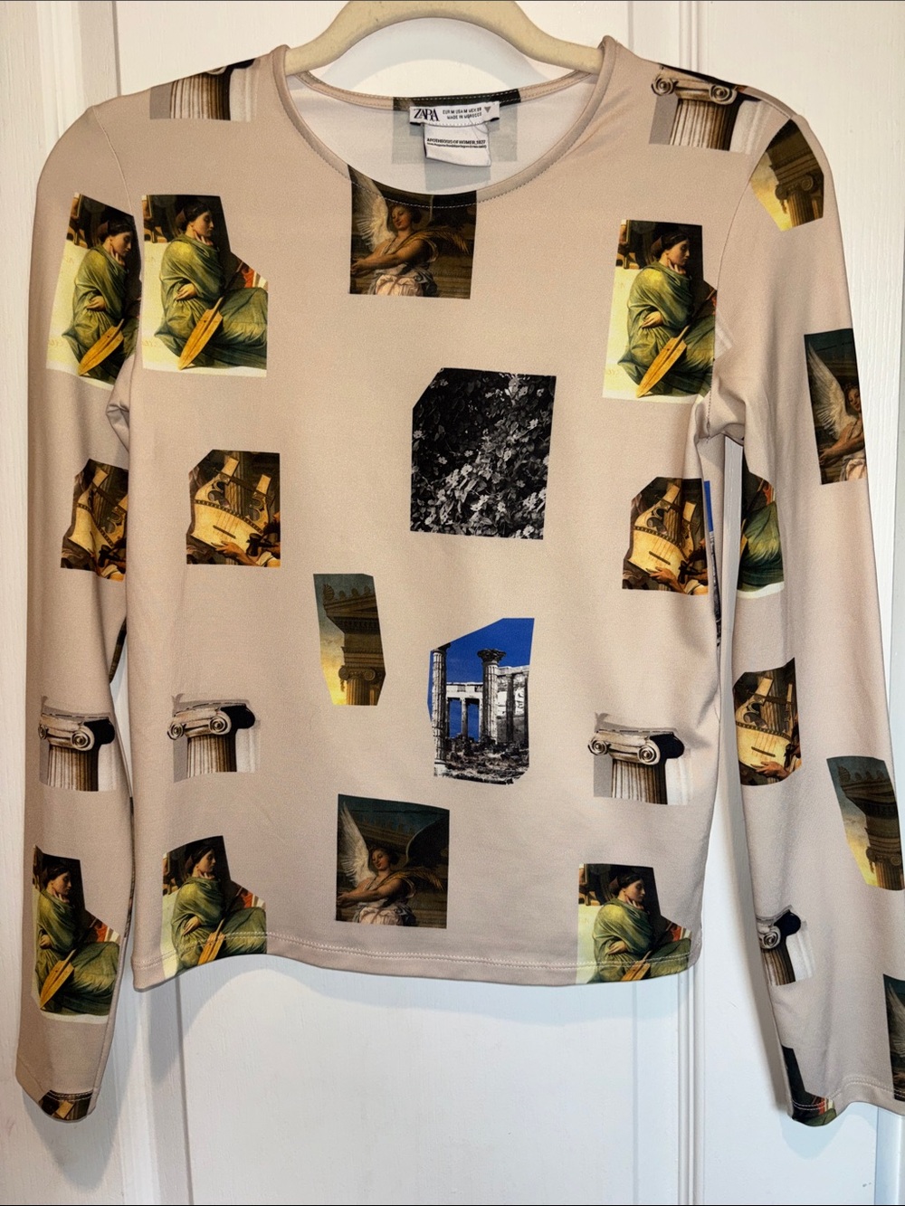 ZARA…APOTHEOSIS OF HOMER 1827….TAN
L/S TOP WITH PICTURES OF HOMER SIZE MEDIUM